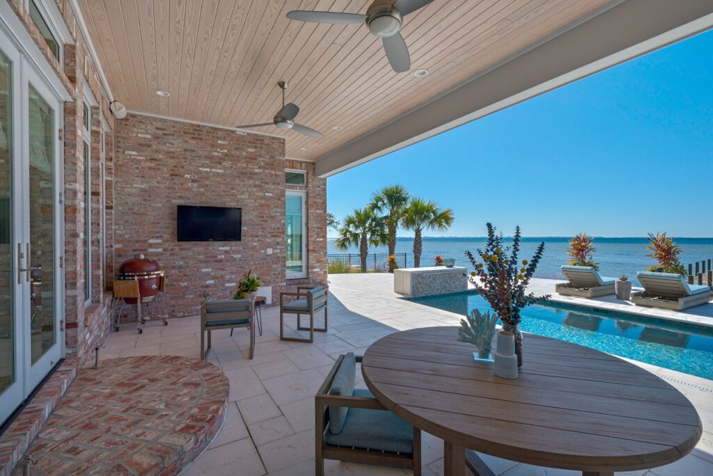 Niceville custom waterfront home patio and pool